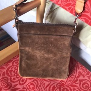 Suede coach crossbody